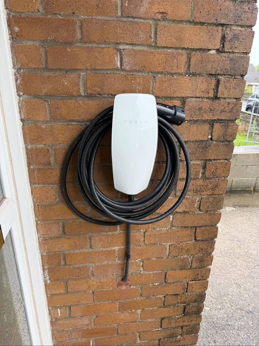 Real Tesla home EV charger fitted by Renovolt