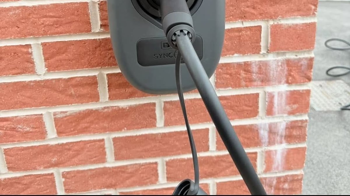 Home EV charger fitted to a house wall in Llanharan by Renovolt Electrical
